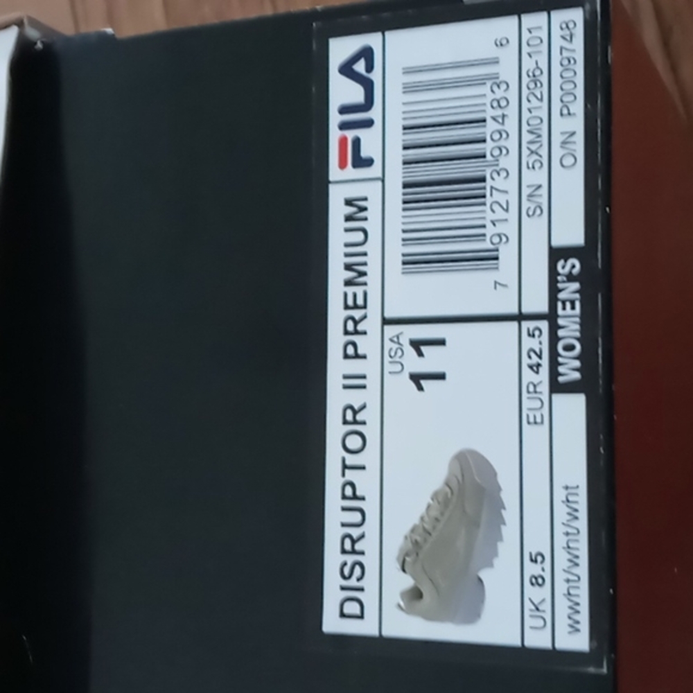 Ladies size 11 beige Filas